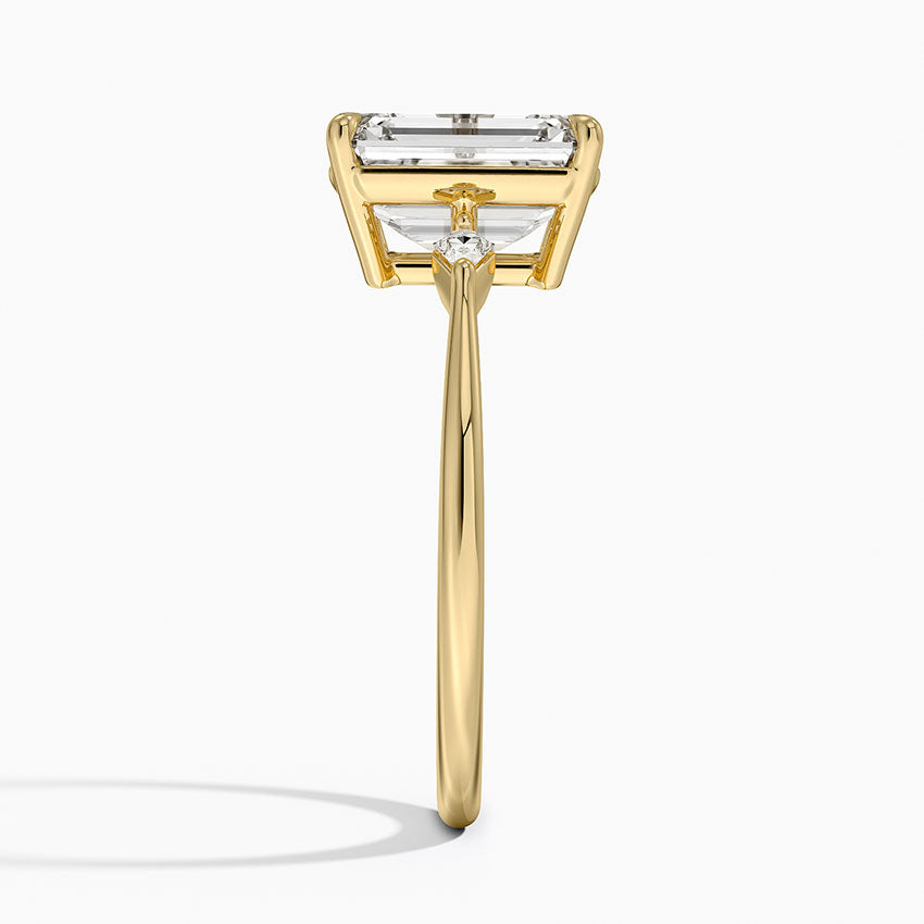 Petite Cometa Three Stone Diamond Ring - Emerald Cut Center Stone