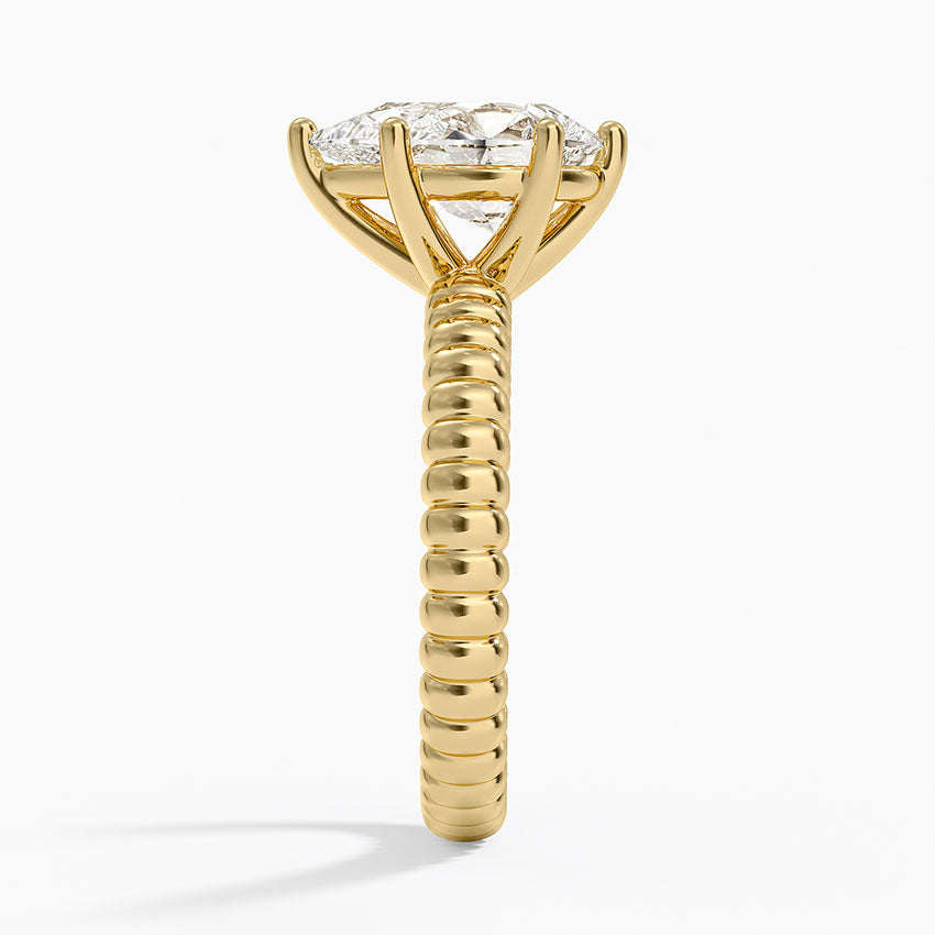 Petra Textured Solitaire Ring - Pear Center Stone