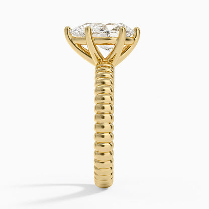 Petra Textured Solitaire Ring - Pear Center Stone