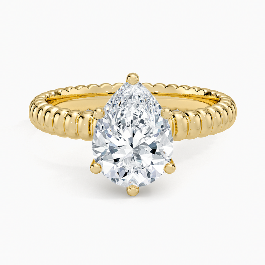 Petra Textured Solitaire Ring - Pear Center Stone