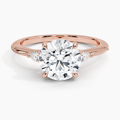 Camellia Three Stone Pear Diamond Ring - Round Center Stone