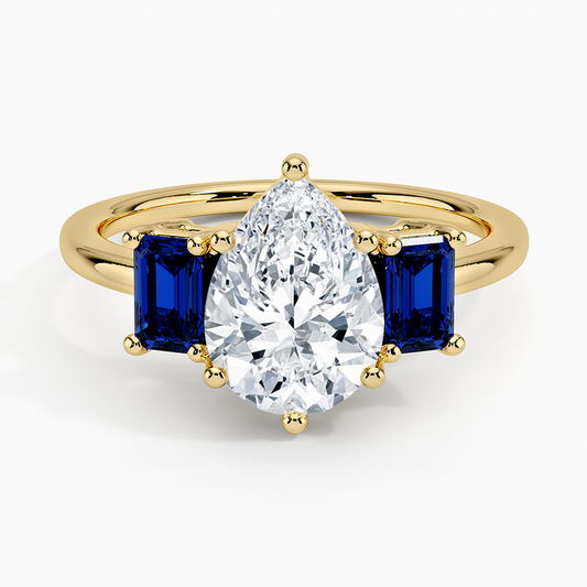 Luxe Rhiannon Three Stone Sapphire Ring - Pear Cut Center Stone