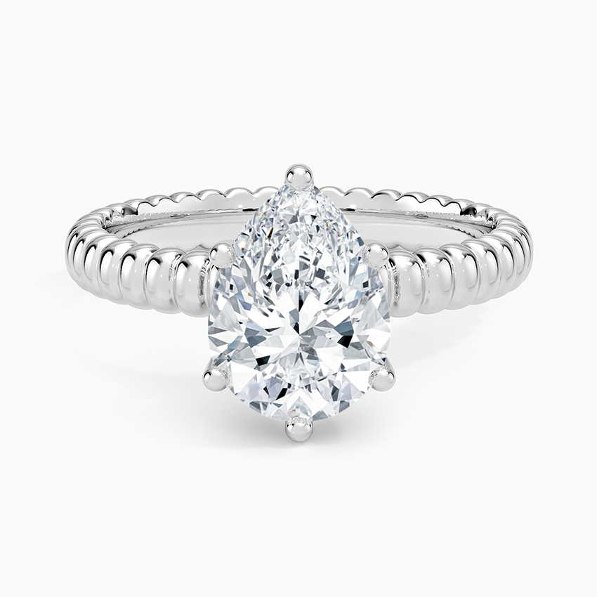 Petra Textured Solitaire Ring - Pear Center Stone