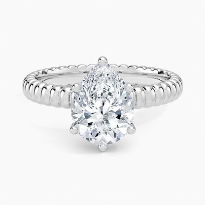 Petra Textured Solitaire Ring - Pear Center Stone