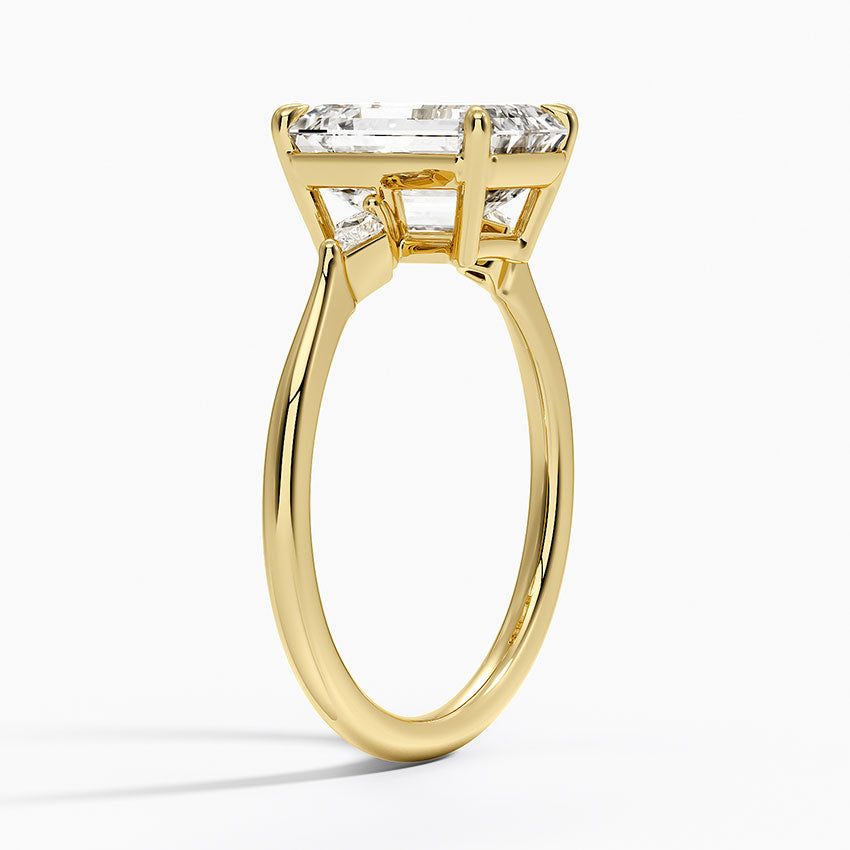 Petite Cometa Three Stone Diamond Ring - Emerald Cut Center Stone