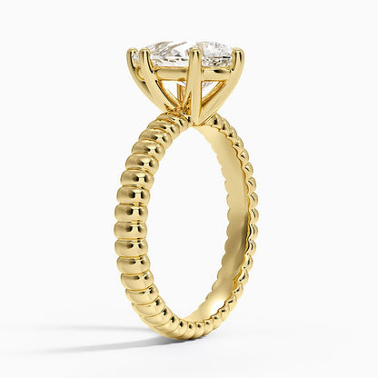 Petra Textured Solitaire Ring - Pear Center Stone